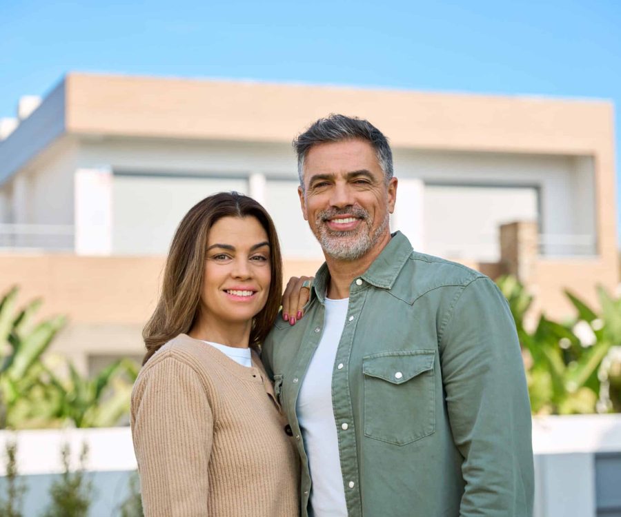 Happy,Smiling,Mature,Older,Family,Couple,New,Property,Buyers,Modern